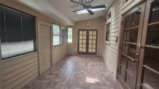 900 Red Fox Rd, Altamonte Springs, FL 32714 - unfurnished sunroom with french doors, a skylight, and lofted ceiling