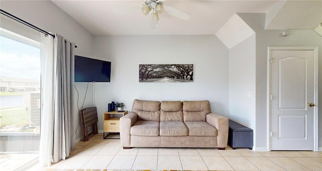 2411 Caravelle Cir, Kissimmee, FL 34746 - living room with light tile patterned flooring, a ceiling fan, and baseboards