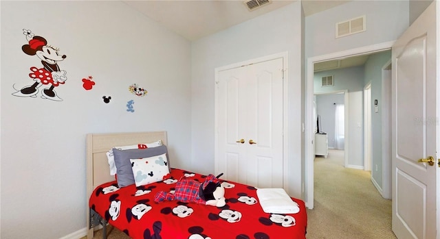 2411 Caravelle Cir, Kissimmee, FL 34746 - bedroom with light colored carpet and baseboards