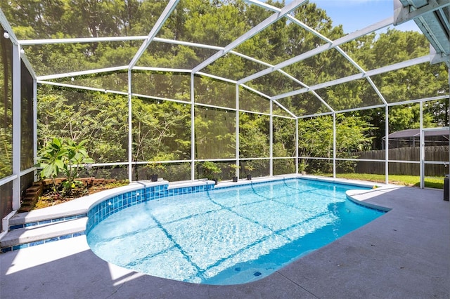 10743 Fairhaven Way, Orlando, FL 32825 - view of swimming pool with a patio and glass enclosure