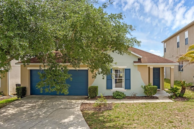 126 San Carlo Rd, Davenport, FL 33896 - view of front facade with concrete driveway, stucco siding, a garage, and a front lawn