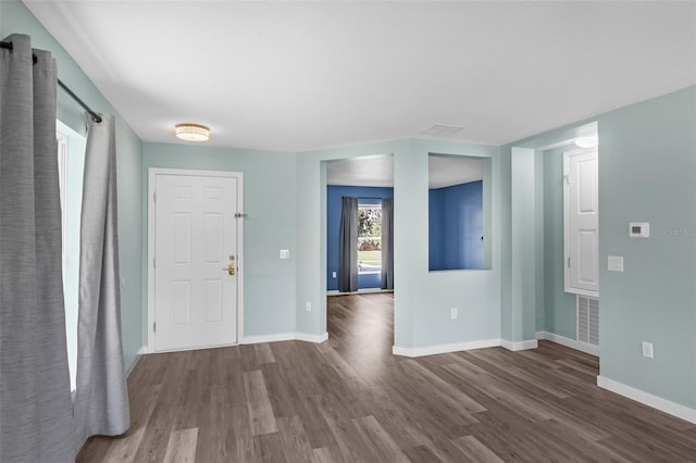 126 San Carlo Rd, Davenport, FL 33896 - entryway featuring wood finished floors and baseboards