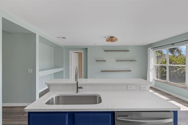 126 San Carlo Rd, Davenport, FL 33896 - kitchen featuring blue cabinets, dishwasher, a sink, and dark wood-style floors