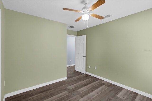 126 San Carlo Rd, Davenport, FL 33896 - empty room with dark wood-style flooring, baseboards, and a ceiling fan
