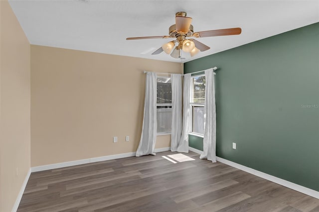 126 San Carlo Rd, Davenport, FL 33896 - empty room featuring wood finished floors, baseboards, and ceiling fan