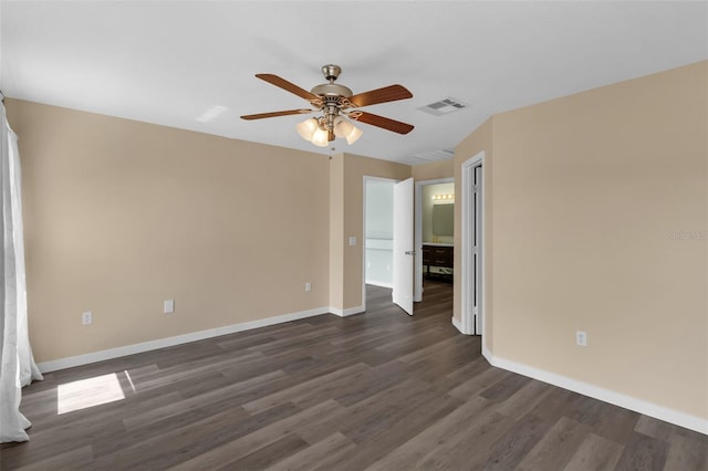 126 San Carlo Rd, Davenport, FL 33896 - spare room with ceiling fan, dark wood-type flooring, and baseboards