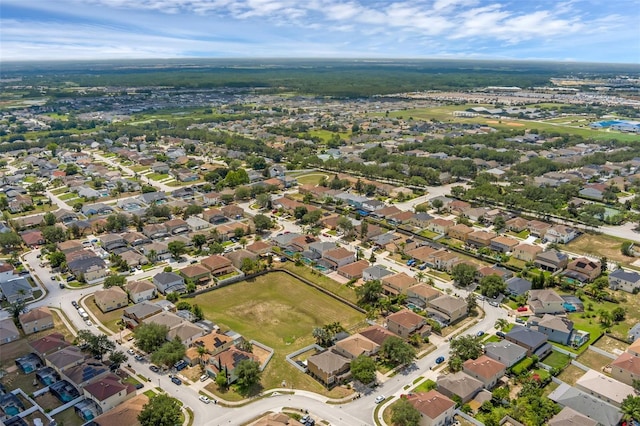 126 San Carlo Rd, Davenport, FL 33896 - aerial overview of property's location with nearby suburban area