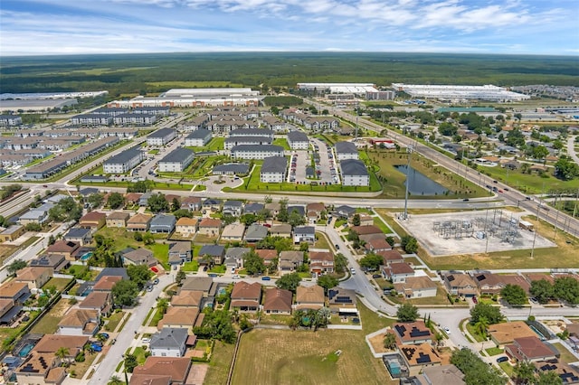 126 San Carlo Rd, Davenport, FL 33896 - aerial overview of property's location featuring a large body of water and nearby suburban area