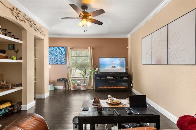 173 Villa Di Este Ter Unit 209, Lake Mary, FL 32746 - living room with crown molding, wood finished floors, a glass covered fireplace, baseboards, and a ceiling fan