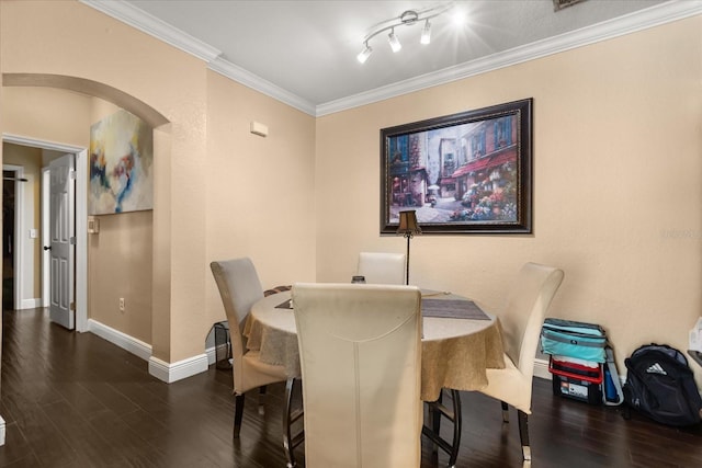 173 Villa Di Este Ter Unit 209, Lake Mary, FL 32746 - dining room with wood finished floors, arched walkways, ornamental molding, and baseboards
