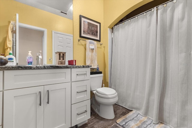 173 Villa Di Este Ter Unit 209, Lake Mary, FL 32746 - full bathroom featuring wood finished floors, toilet, vanity, and curtained shower