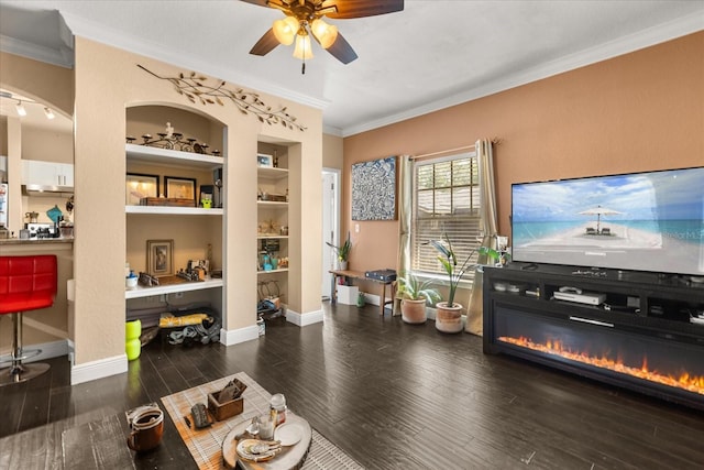 173 Villa Di Este Ter Unit 209, Lake Mary, FL 32746 - living area featuring ornamental molding, built in shelves, ceiling fan, wood finished floors, and baseboards
