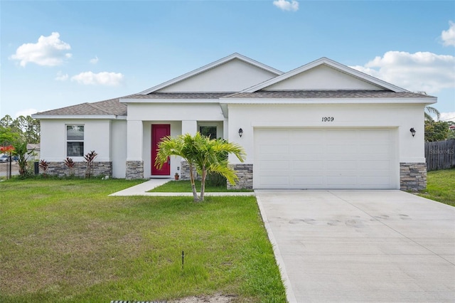 1909 Thomasville Ave SE, Palm Bay, FL 32909 - ranch-style house featuring stone siding, stucco siding, a shingled roof, and a front lawn