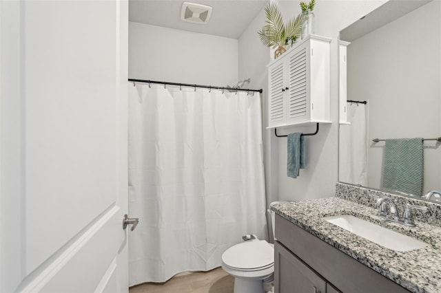 1909 Thomasville Ave SE, Palm Bay, FL 32909 - full bathroom featuring vanity and toilet