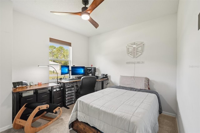 1909 Thomasville Ave SE, Palm Bay, FL 32909 - carpeted bedroom with a desk, ceiling fan, and baseboards