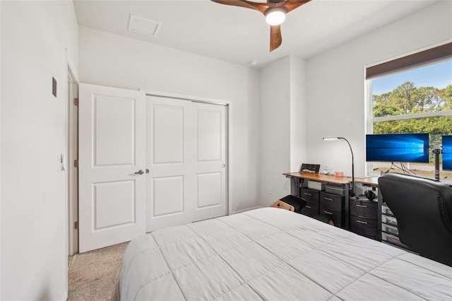 1909 Thomasville Ave SE, Palm Bay, FL 32909 - carpeted bedroom featuring a ceiling fan, a closet, and an office area