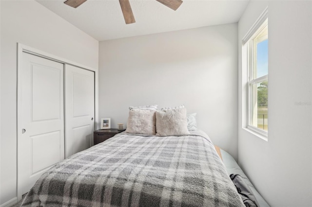 1909 Thomasville Ave SE, Palm Bay, FL 32909 - bedroom featuring multiple windows, a closet, and a ceiling fan