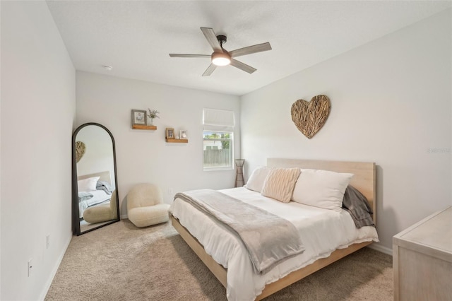 1909 Thomasville Ave SE, Palm Bay, FL 32909 - bedroom featuring light carpet, ceiling fan, and baseboards