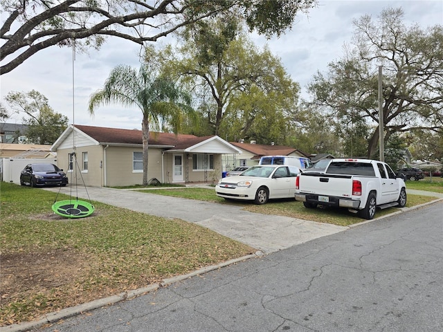 864 E Lowell St, Lakeland, FL 33805 - view of front of home featuring a front lawn and driveway