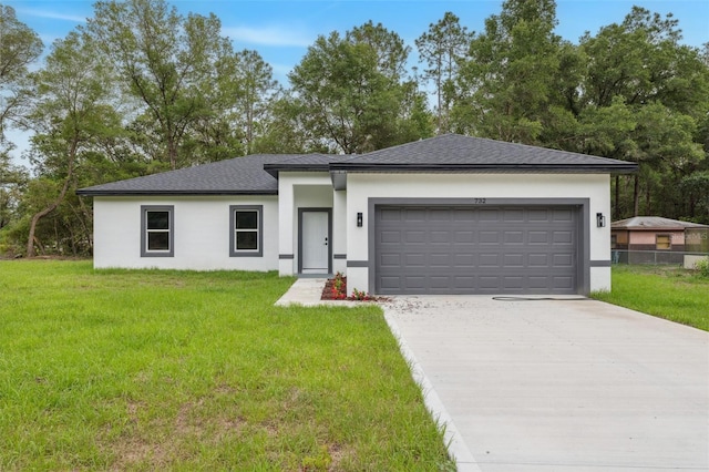 8944 N Pitcairn Way, Citrus Springs, FL 34434 - view of front of home featuring stucco siding, concrete driveway, a garage, and a shingled roof