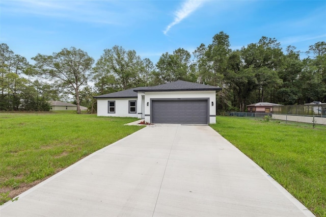 8944 N Pitcairn Way, Citrus Springs, FL 34434 - view of front of property with stucco siding, a garage, and driveway