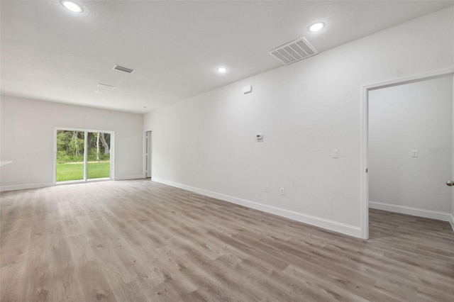 8944 N Pitcairn Way, Citrus Springs, FL 34434 - spare room with light wood finished floors, baseboards, and recessed lighting
