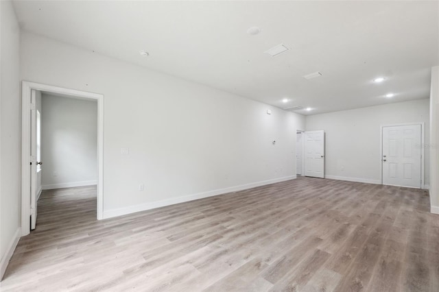 8944 N Pitcairn Way, Citrus Springs, FL 34434 - unfurnished room featuring light wood-style flooring, baseboards, and recessed lighting