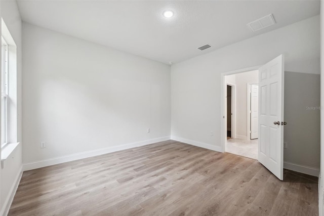 8944 N Pitcairn Way, Citrus Springs, FL 34434 - unfurnished room featuring light wood-type flooring and baseboards