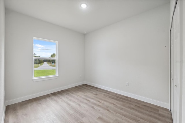 8944 N Pitcairn Way, Citrus Springs, FL 34434 - spare room with light wood-style floors and baseboards