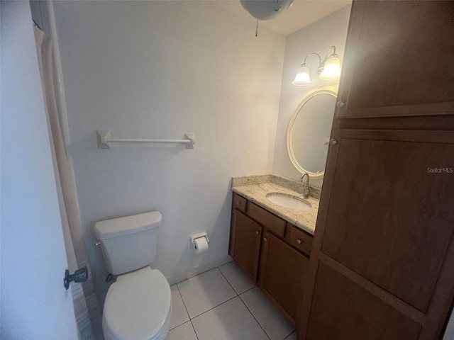 2426 Windward Way, Winter Park, FL 32792 - bathroom with vanity, toilet, and tile patterned floors