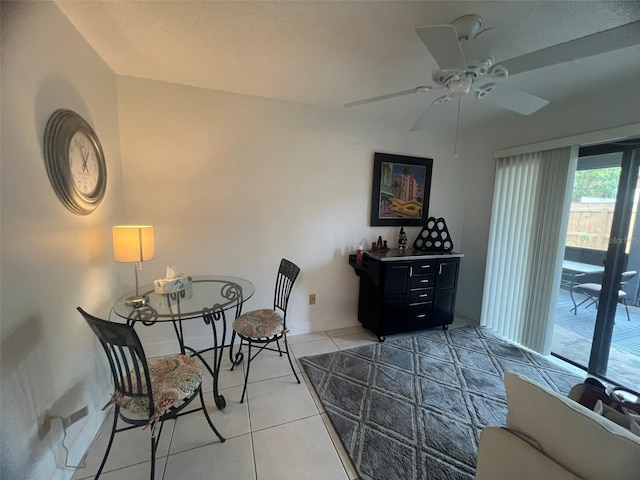 2426 Windward Way, Winter Park, FL 32792 - dining room with light tile patterned floors, ceiling fan, and baseboards
