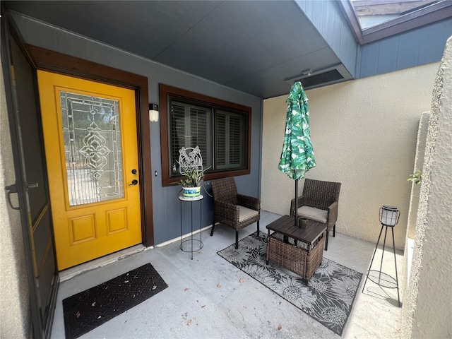 2426 Windward Way, Winter Park, FL 32792 - property entrance with stucco siding and a porch