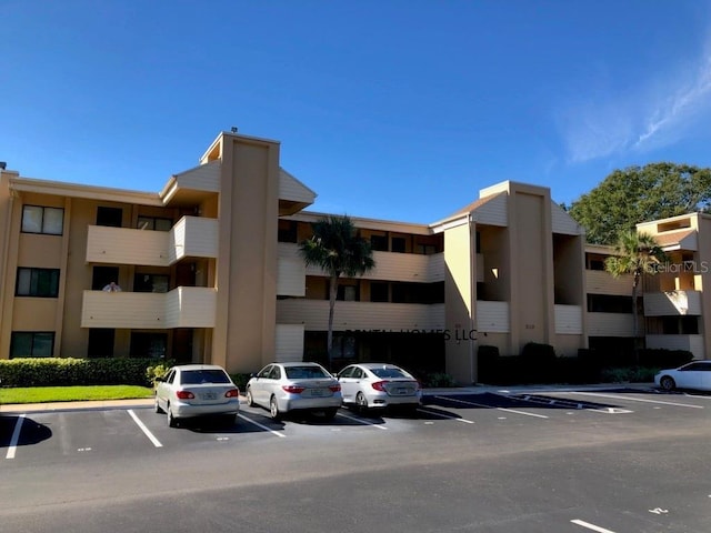 510 Cranes Way Unit 302, Altamonte Springs, FL 32701 - view of apartment building / complex featuring uncovered parking