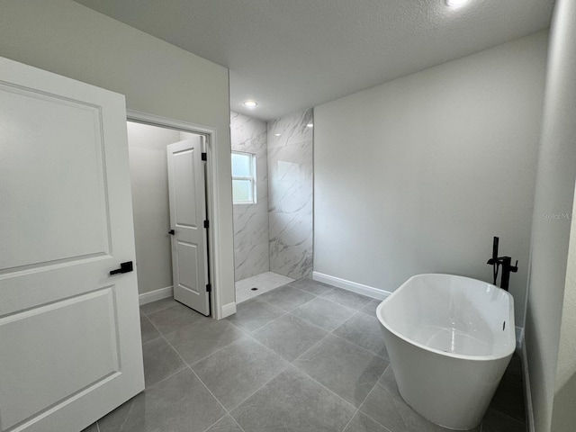 16463 SW 55th Court Rd, Ocala, FL 34473 - full bathroom with a marble finish shower, baseboards, a soaking tub, and recessed lighting