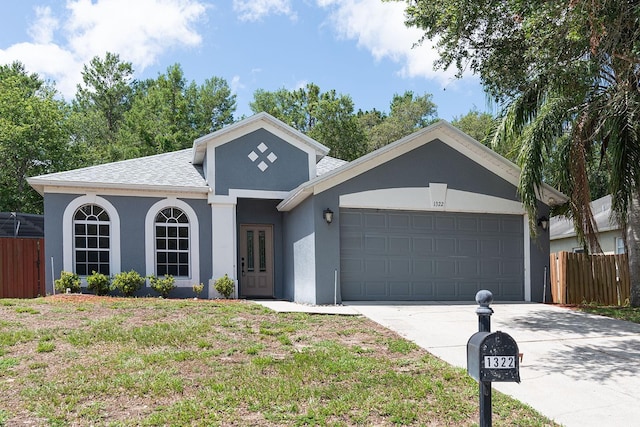 1322 Reagans Reserve Blvd, Apopka, FL 32712 - ranch-style house featuring stucco siding, a garage, and concrete driveway