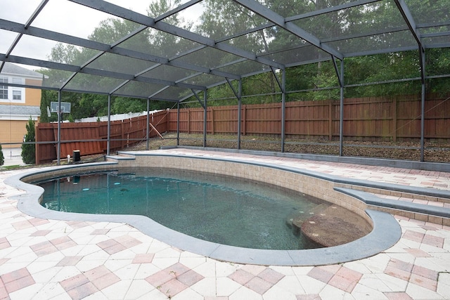 1322 Reagans Reserve Blvd, Apopka, FL 32712 - view of swimming pool with a fenced backyard, glass enclosure, and a patio