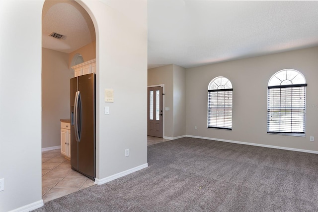 1322 Reagans Reserve Blvd, Apopka, FL 32712 - unfurnished room featuring light colored carpet and arched walkways