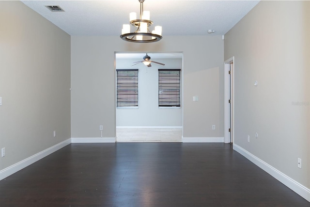 1322 Reagans Reserve Blvd, Apopka, FL 32712 - spare room featuring a chandelier, wood finished floors, and a ceiling fan