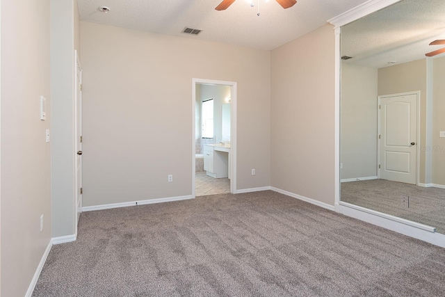 1322 Reagans Reserve Blvd, Apopka, FL 32712 - unfurnished bedroom featuring carpet flooring, ensuite bathroom, and ceiling fan