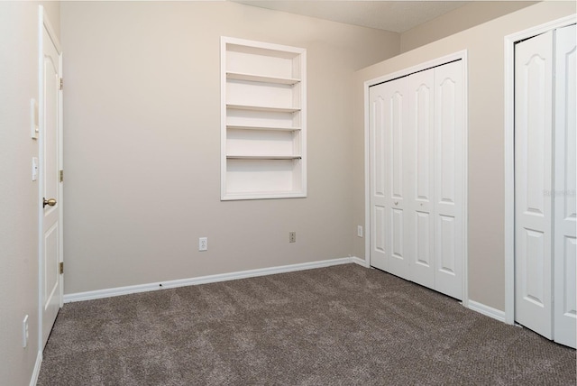 1322 Reagans Reserve Blvd, Apopka, FL 32712 - unfurnished bedroom with carpet flooring and two closets