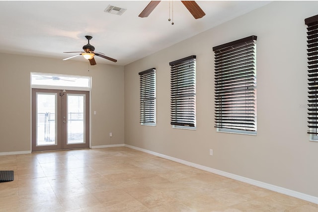 1322 Reagans Reserve Blvd, Apopka, FL 32712 - empty room with ceiling fan, french doors, and light tile patterned floors