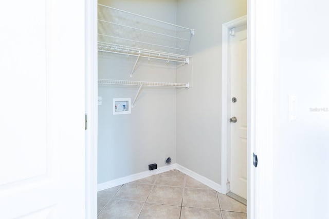 1322 Reagans Reserve Blvd, Apopka, FL 32712 - washroom featuring hookup for a washing machine and light tile patterned floors