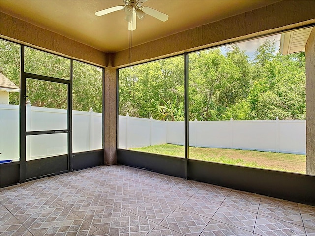 6843 Cherry Grove Cir, Orlando, FL 32809 - unfurnished sunroom featuring ceiling fan