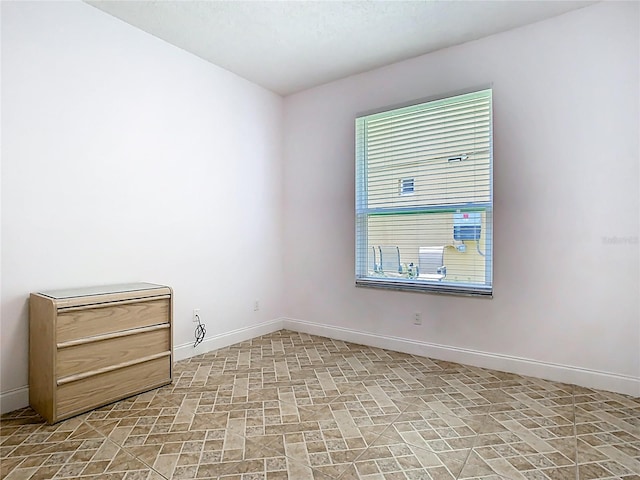6843 Cherry Grove Cir, Orlando, FL 32809 - spare room featuring baseboards