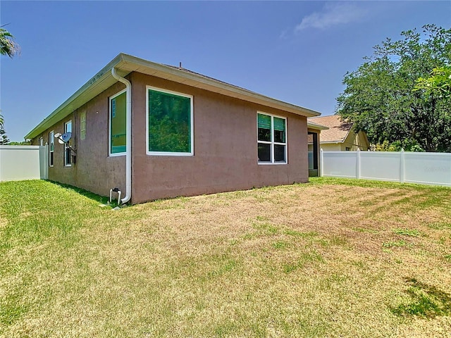 6843 Cherry Grove Cir, Orlando, FL 32809 - view of home's exterior with stucco siding