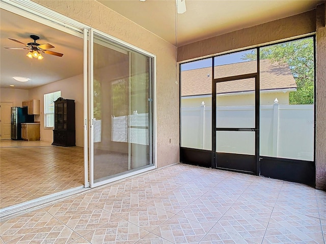 6843 Cherry Grove Cir, Orlando, FL 32809 - unfurnished sunroom featuring plenty of natural light