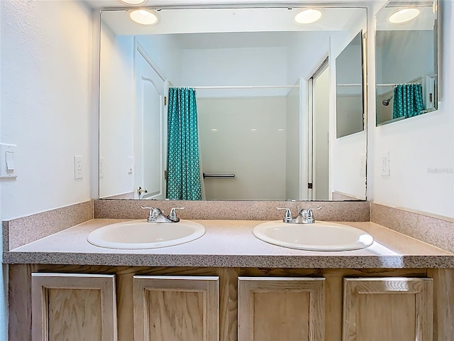 6843 Cherry Grove Cir, Orlando, FL 32809 - bathroom featuring double vanity and a shower with curtain