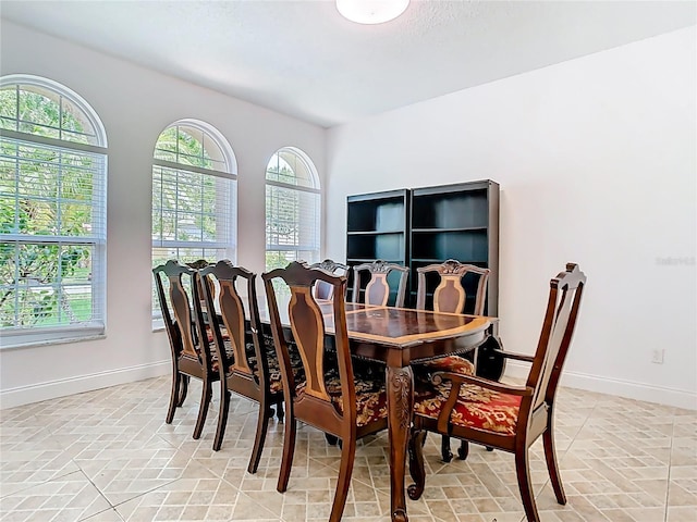 6843 Cherry Grove Cir, Orlando, FL 32809 - dining space featuring baseboards