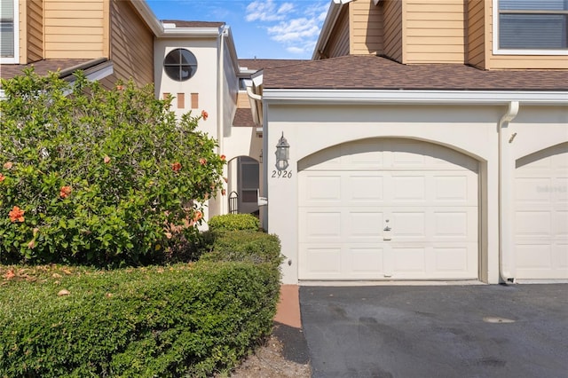2926 Claremont Ct Unit Ge, Orlando, FL 32822 - garage with driveway