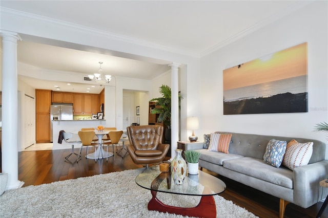 2305 Edgewater Dr Unit 1613, Orlando, FL 32804 - living area with ornate columns, dark wood-style flooring, crown molding, and a chandelier